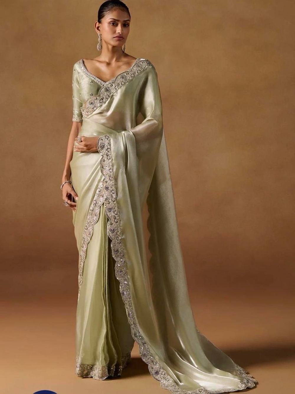 LASHKARAA Sleek Sage Green Saree with Silver Embroidered Border